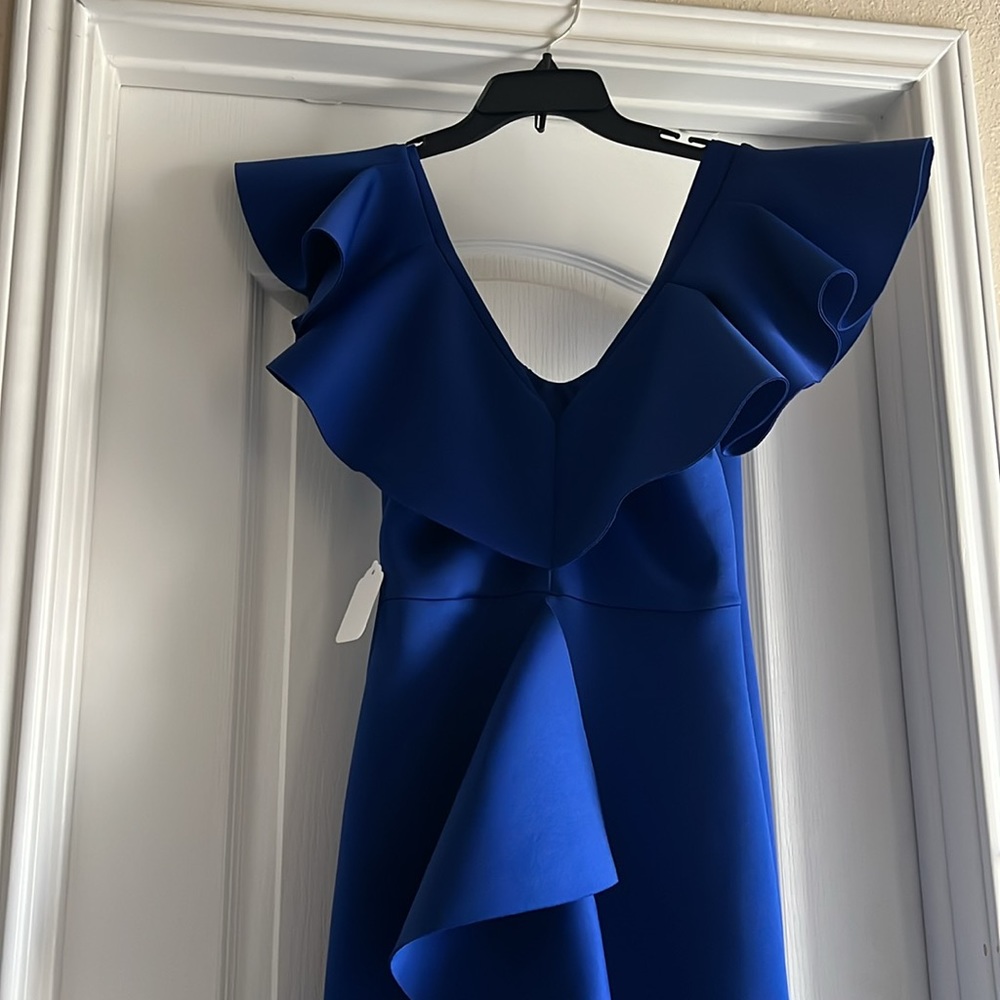 Ruffle shoulder blue gown